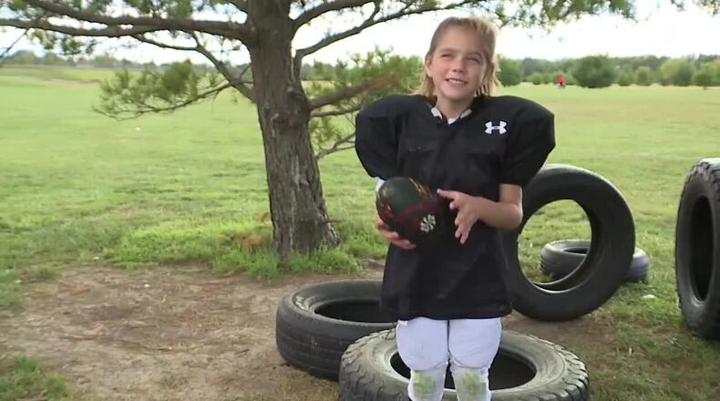 6-year-old Josie Stamper plays tackle football in Fairfield. RAE HINES/WCPO
