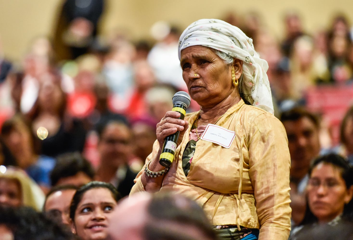 Nearly 100 people become U.S. citizens at naturalization ceremony at Miami Hamilton