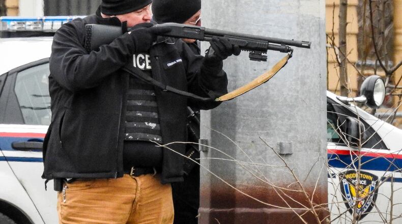 A man is in custody after police worked for approximately 90 minutes to get him to exit a home after officers responded on a report of a disturbance between a father and son, where shots were possibly fired, according to Middletown’s Chief of Police. The standoff occurred at a home in the 3000 block of Yankee Road Thursday, February 1. NICK GRAHAM/STAFF