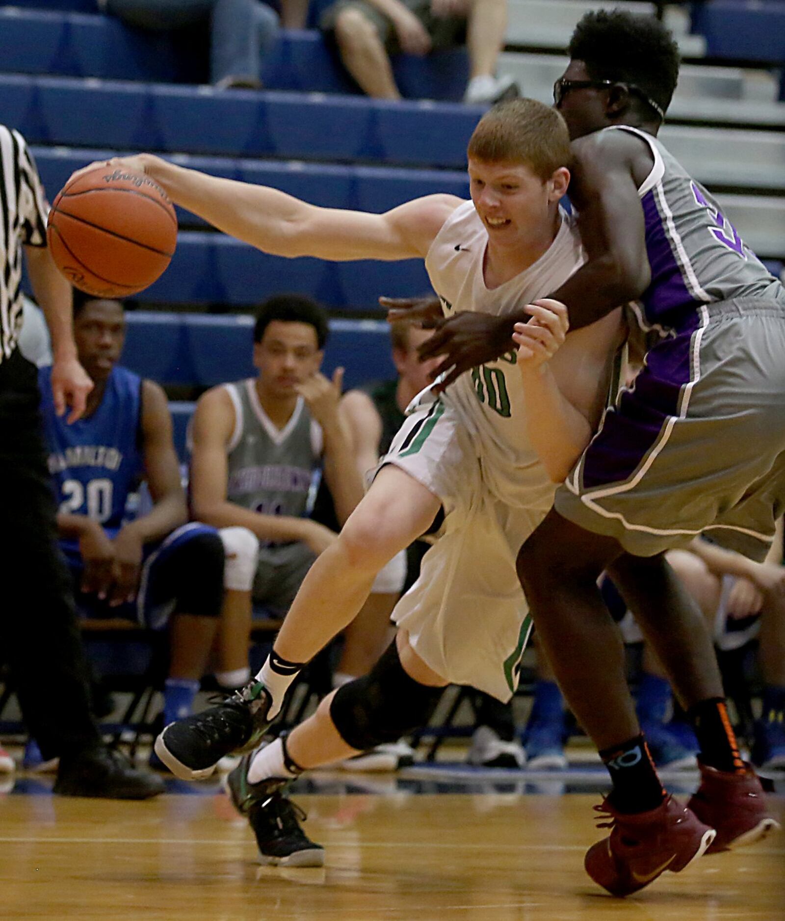 Harrison’s Jacob Back tries to put a move on Middletown’s Jomar Bailey during Saturday’s inaugural All-Butler County All-Star boys basketball game at the Hamilton Athletic Center. CONTRIBUTED PHOTO BY E.L. HUBBARD