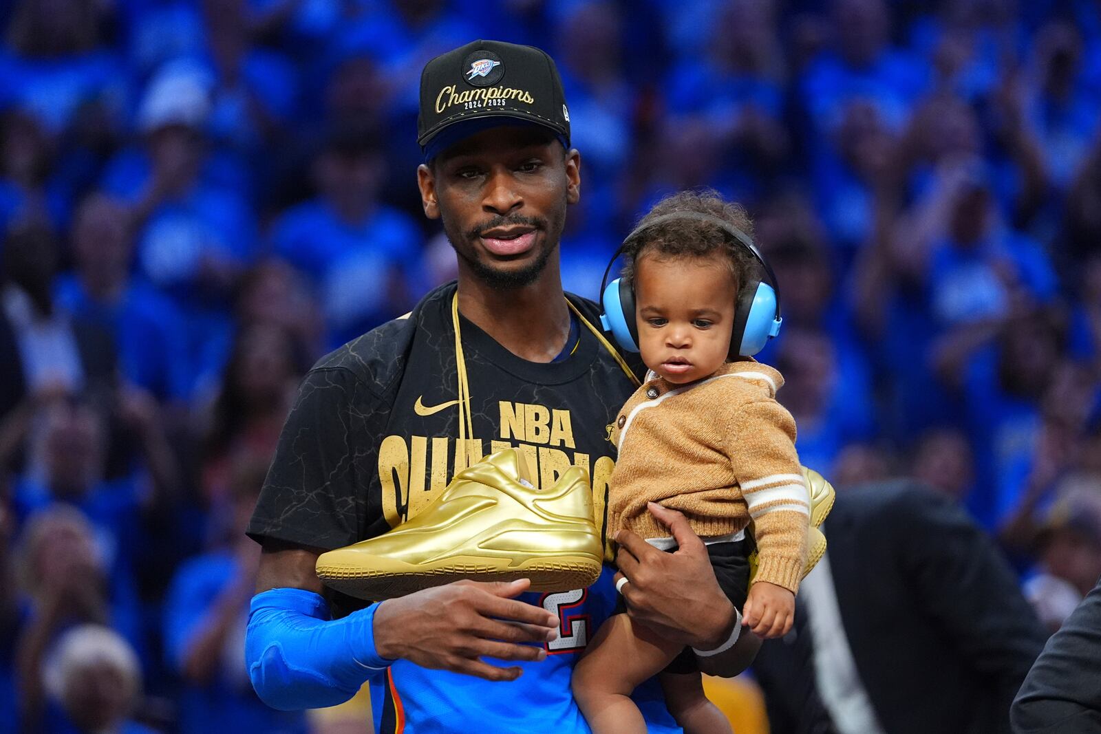 Oklahoma City Thunder guard Shai Gilgeous-Alexander celebrates after they won the NBA basketball championship with a Game 7 victory against the Indiana Pacers Sunday, June 22, 2025, in Oklahoma City. (AP Photo/Julio Cortez)
