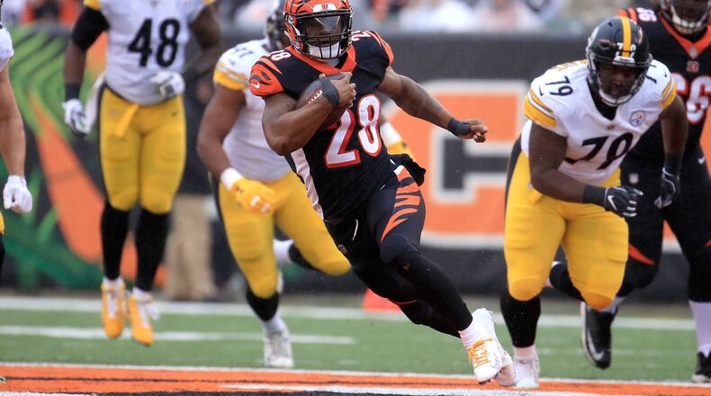 CINCINNATI, OH - OCTOBER 14: #28 of the Cincinnati Bengals runs with the ball against the Pittsburgh Steelers at Paul Brown Stadium on October 14, 2018 in Cincinnati, Ohio. (Photo by Andy Lyons/Getty Images)