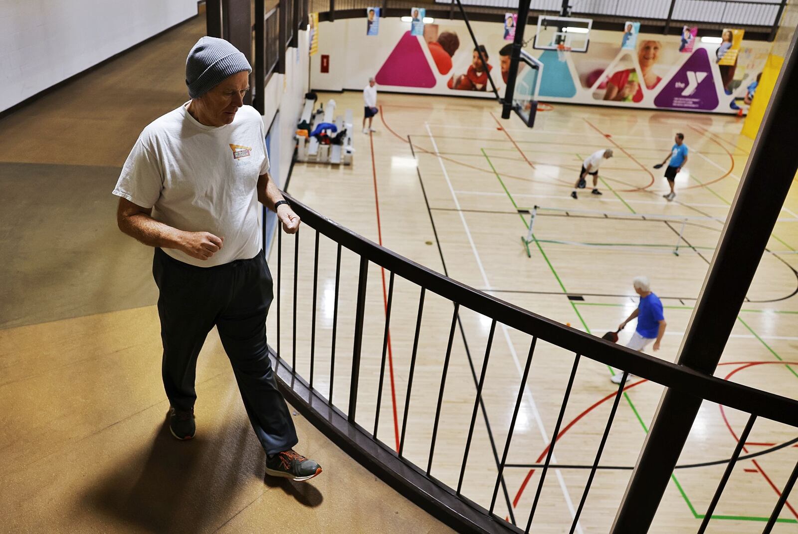 Jeff Jena had triple bypass surgery and now walks at Middletown YMCA every morning as part of his rehabilitation. NICK GRAHAM/STAFF