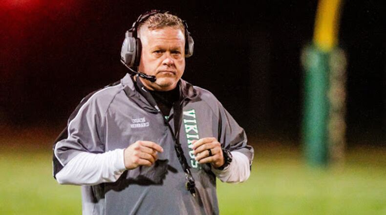 Former Madison High School Head Football Coach Jesse Hubbard's coaching contract was not renewed during a recent school board meeting and the Butler County Sheriff deputies were called out to the meeting for supporters who allegedly threatening board members. Hubbard, shown here in 2019 coaching New Miami High School's team, says there was no reason given to him for the contract's non-renewal and he said calling out deputies was an unwarranted over-reaction to the situation. (File Photo\Journal-News)