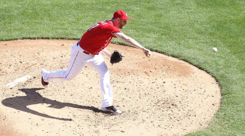 Reds starter Scott Feldman pitches against the Giants on Sunday, May 7, 2017, at Great American Ball Park in Cincinnati. David Jablonski/Staff