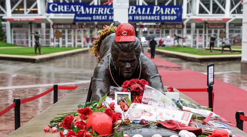 Thousands of Reds fans braved the steady rains to pay their respects to Cincinnati Reds legend and Major League Baseball’s all-time hits leader Pete Rose for a memorial visitation on Sunday, Nov. 10, 2024, at Great American Ball Park. Hosted by the Cincinnati Reds and Rose’s family, the visitation lasted 14 hours, a tribute to the “Hit King’s” jersey number. Rose died on Sept. 30 at the age of 83. TOM GILLIAM / CONTRIBUTING PHOTOGRAPHER