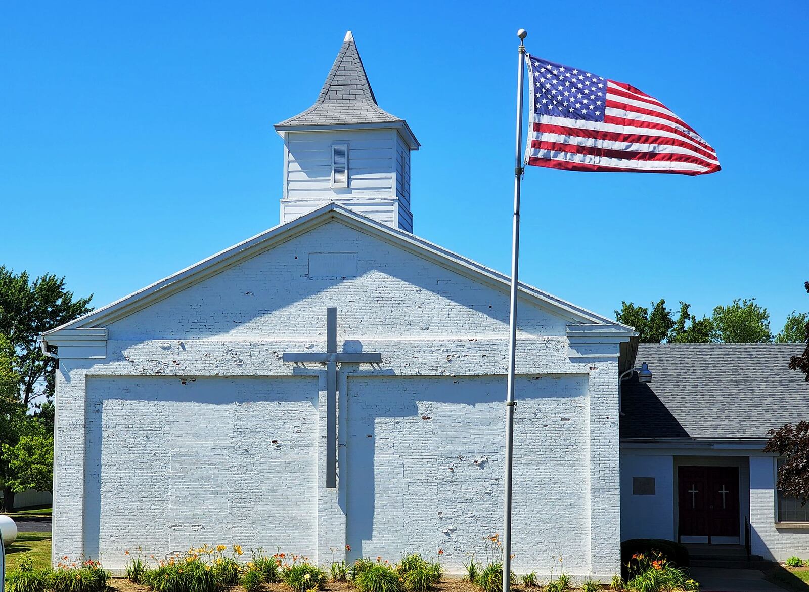Pleasant Ridge United Methodist Church, better known as the “Little White Church at the top of West Middletown Hill,” was founded in 1822 and will celebrate its bicentennial this fall. NICK GRAHAM/STAFF