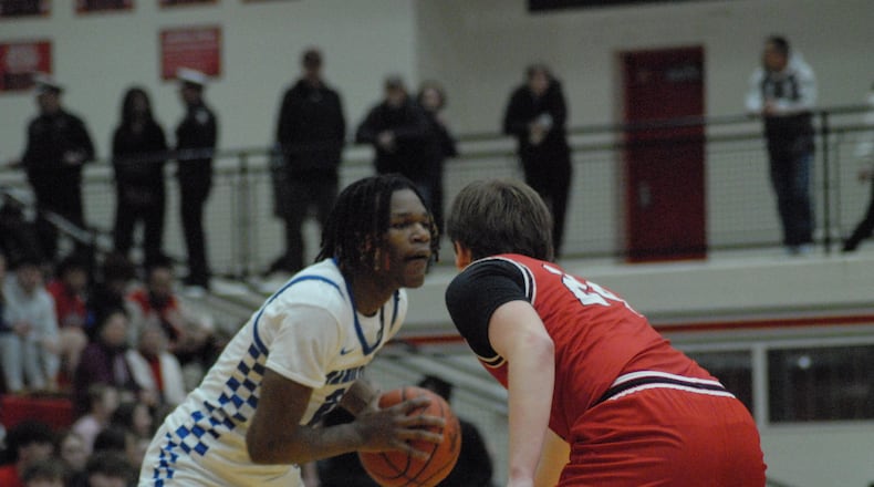 Hamilton's Andrea Holden is guarded by Fairfield's Lucas Davids on Wednesday night. Chris Vogt/CONTRIBUTED