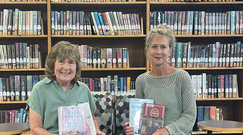 Cutline: Librarians Pam Dittner (left) and Chris Williams facilitate The Rowdy Readers book club at Brown Memorial Library. CONTRIBUTED