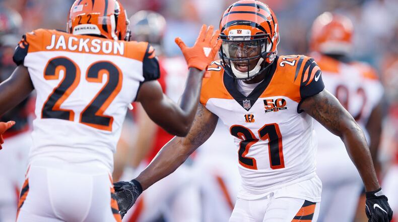 CINCINNATI, OH - AUGUST 11: Darqueze Dennard #21 and William Jackson III #22 of the Cincinnati Bengals celebrate in the first quarter of a preseason game against the Tampa Bay Buccaneers at Paul Brown Stadium on August 11, 2017 in Cincinnati, Ohio. (Photo by Joe Robbins/Getty Images)