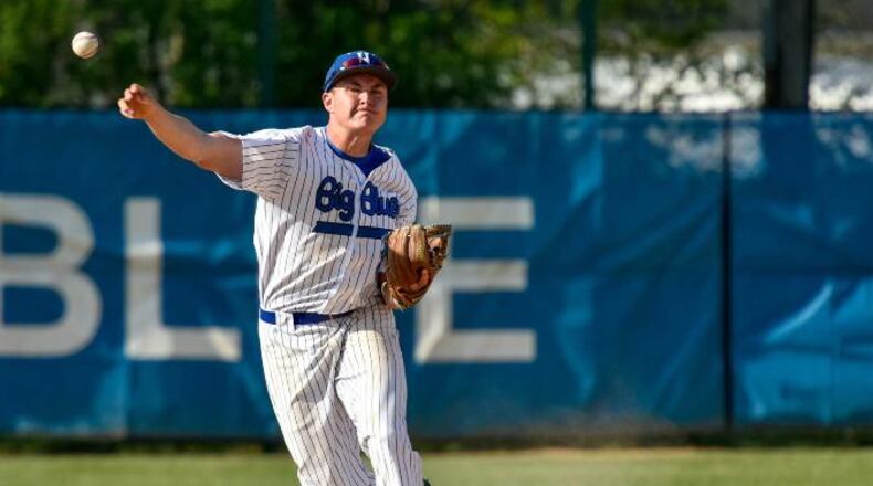 Hamilton's Landon Stephens makes a throw to first during their 6-0 loss to Lakota East Monday, April 25 at Hamilton High School. NICK GRAHAM/STAFF