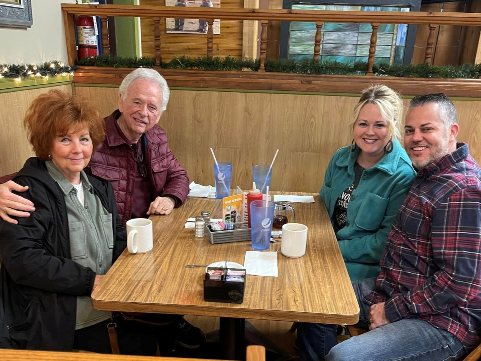 Joe Shutts, (front Right) and his wife Holly (back right) have breakfast with his mentor, Billy Watson (Left back) and his wife Nancy. Shutts credits this mentoring relationship for changing the trajectory of his life.