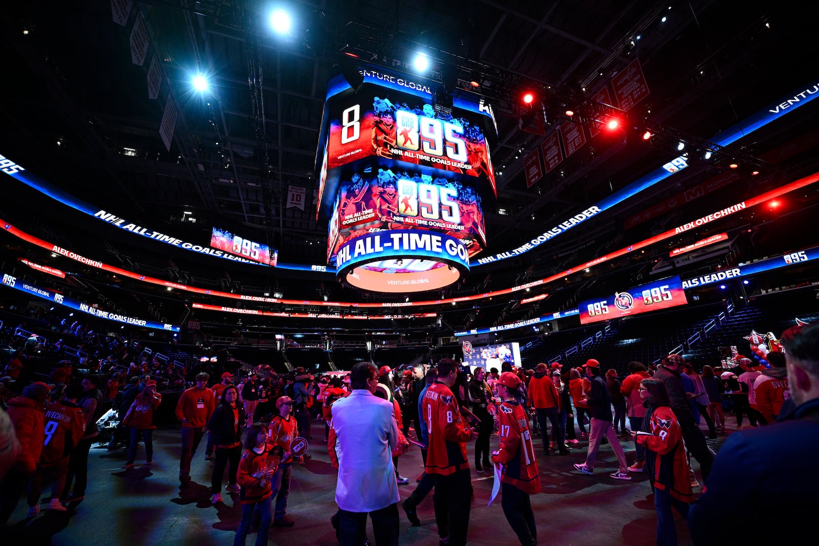 Fans attend the GR8 city celebration to honor Washington Capitals' Alex Ovechkin for scoring 895 NHL career goals, Friday, April 11, 2025, in Washington. (AP Photo/Nick Wass)