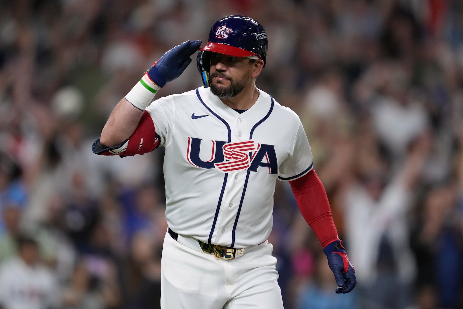 United States designated hitter Kyle Schwarber celebrates after hitting a home run during the fifth inning of a World Baseball Classic game against Britain, Saturday, March 7, 2026, in Houston. (AP Photo/Ashley Landis)
