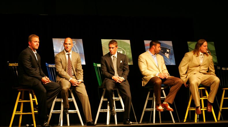 L-R: Centerville Alum, OSU QB and ESPN college football analyst Kirk Herbstreit, former OSU player and current Indianapolis Colt Anthony Gonzalez, former Centerville, OSU, and current NY Jet kicker Mike Nugent, former OSU and current New England Patriot Mike Vrabel, and former Centerville, OSU and current Green Bay Packer A.J. Hawk sit onstage during the Sonny Unger Foundation Program at the Dayton Convention Center Wednesday evening. Photo by Jim Witmer