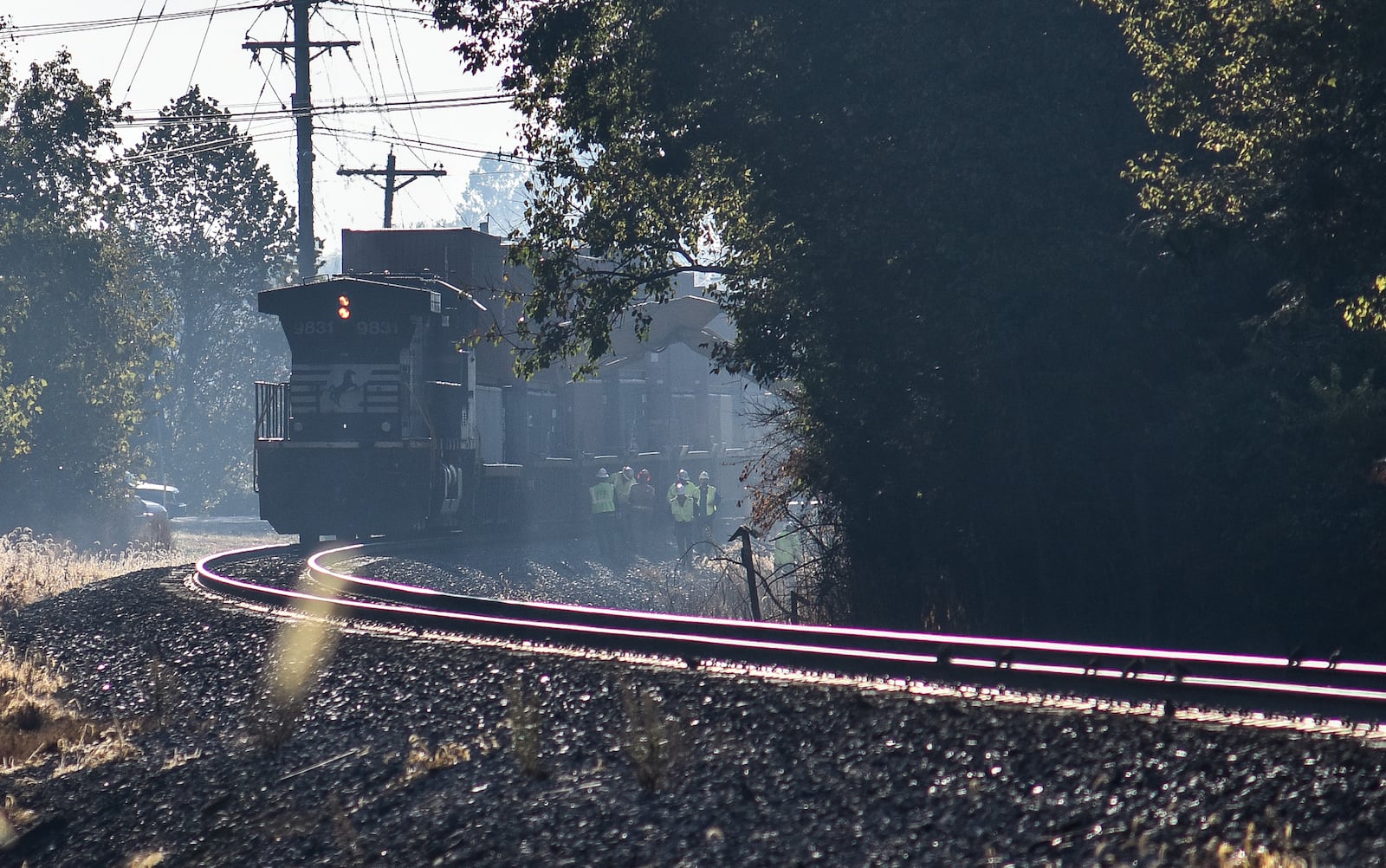 The collision between two trains early Tuesday morning, Oct. 8, 2019 in Hamilton, and near the southern Fairfield border caused three train cars to derail and left two crew members with minor injuries. The cars were back on track and the train was able to move around 10 a.m. “The rear three cars … contained one load of pulpwood and two loads of butane,” said Rachel McDonnell Bradshaw, spokeswoman for Norfolk Southern Corporation headquarters in Virginia. NICK GRAHAM/STAFF