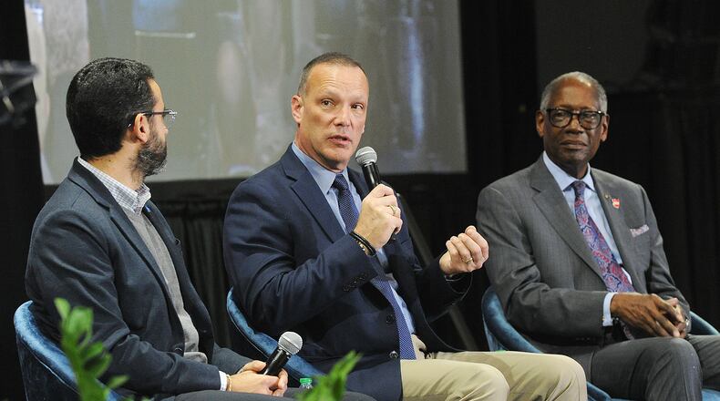 Panelists answered questions at the Dayton Development Coalition's annual meeting Wednesday, Feb. 7, 2024, Panelists were from left, Didier Papadapoulos, head of aircraft OEM for Joby Aviation, Inc., Jon Piatt, executive vice president for ISR, aviation & security at Sierra Nevada Corp. and retired U.S. Air Force Gen. Lester L. Lyles. The event was held at the National Museum of the U. S. Air Force. MARSHALL GORBY\STAFF