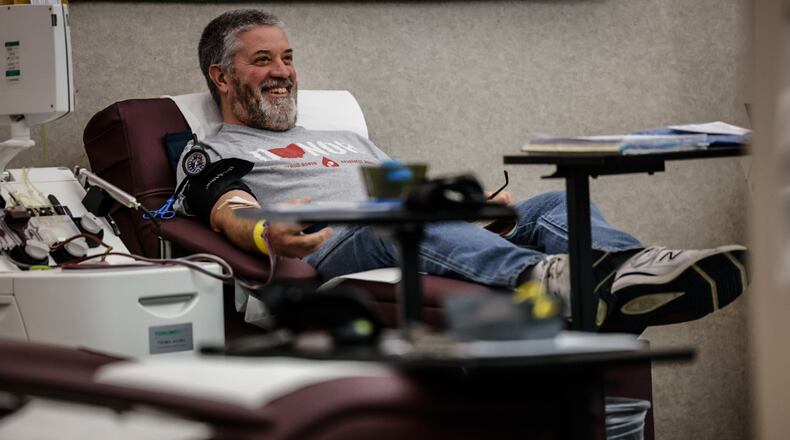 Stephen Grusenmeyer, from Tipp City, donates platelets at the Solvita Blood Center in Dayton on Tuesday January 9, 2024. The Dayton region is in critical need of certain blood types. JIM NOELKER/STAFF