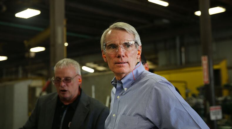 U.S. Sen. Rob Portman tours Pioneer Pipe while campaigning in the area on October 25, 2016 in Marietta, Ohio. Portman is leading Democratic ex-Gov. Ted Strickland by double-digits in the polls. Ohio has become one of the key battleground states in the 2016 presidential election with both candidates or their surrogates making weekly visits to the Buckeye State. Unlike other parts of America, Ohio has both a rapidly aging and declining population; it is also overwhelmingly white and has a high degree of residents without a college education. (Photo by Spencer Platt/Getty Images)