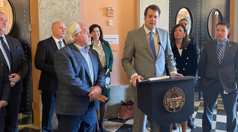Ohio state Rep. Derek Merrin, who continues to claim that he is the leader of the majority of the House Republican caucus despite losing his bid for speaker of the House, talks to reporters on Wednesday, Feb. 15, 2023, at the Ohio Statehouse in Columbus, Ohio, alongside his advocates about their own legislative priorities, separate from those laid out by elected House Speaker Jason Stephens earlier that day. (AP Photo/Samantha Hendrickson)