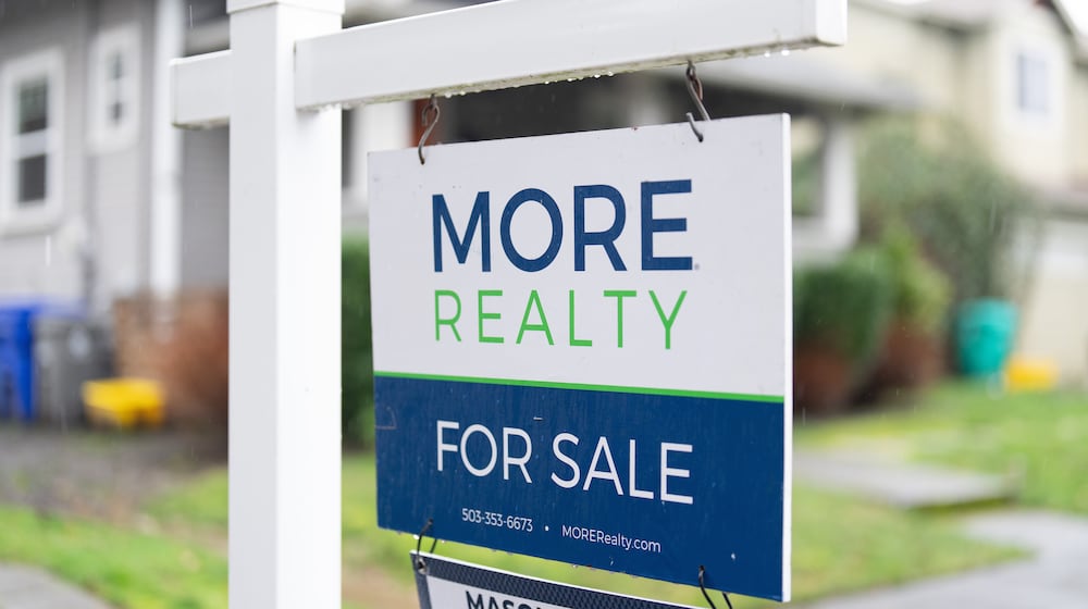 FILE - A "For Sale" sign is seen on Tuesday, Jan. 6, 2026, in Portland, Ore. (AP Photo/Jenny Kane, File)