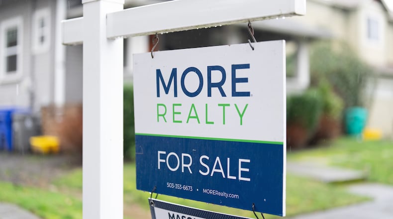 FILE - A "For Sale" sign is seen on Tuesday, Jan. 6, 2026, in Portland, Ore. (AP Photo/Jenny Kane, File)
