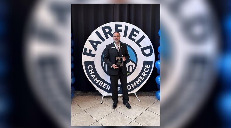 Scott Clark, a father of three Fairfield school children, is a district manager with First Financial Bank and was recently named volunteer of the year by the Fairfield Chamber of Commerce. CONTRIBUTED
