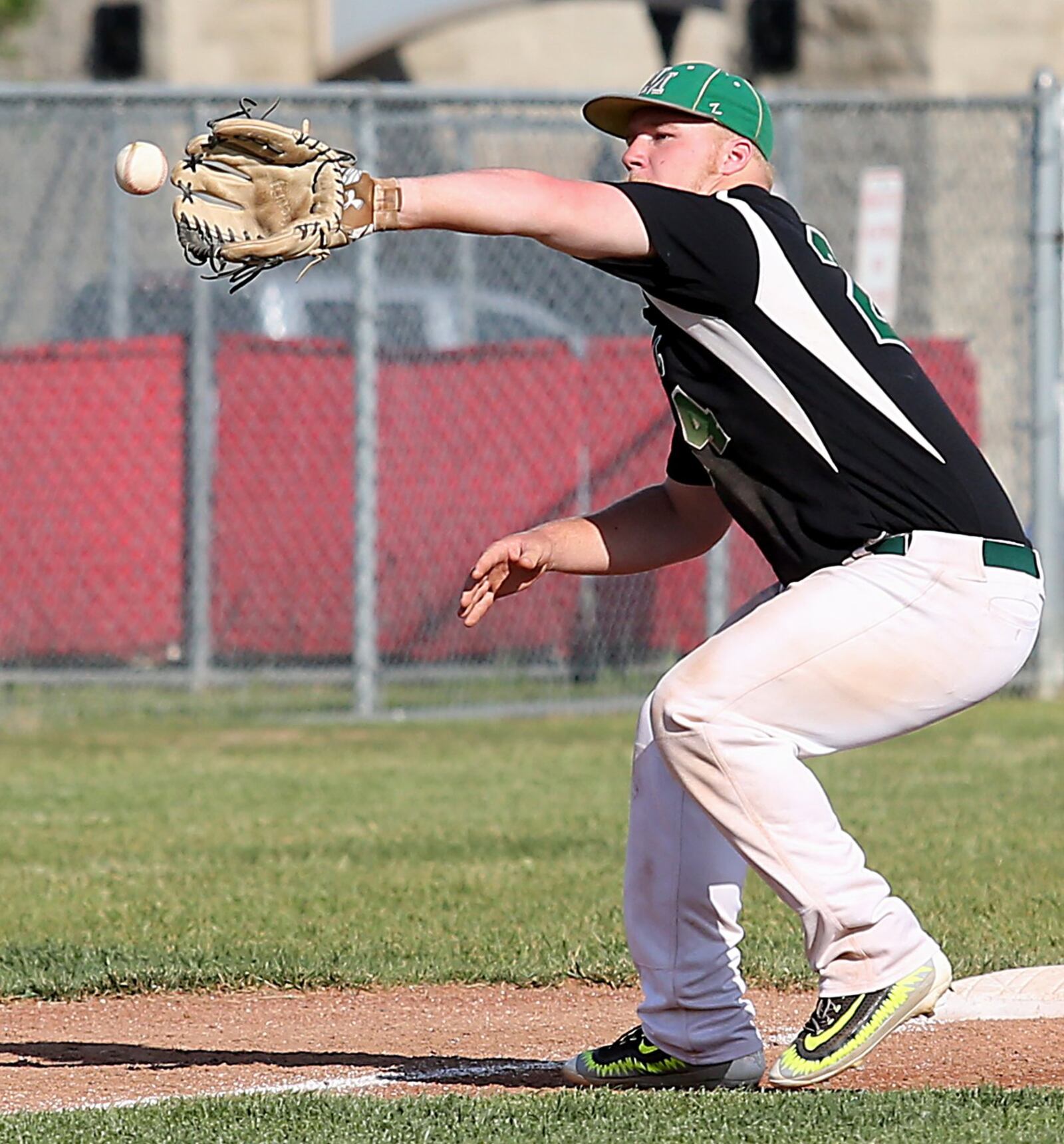 New Miami third baseman Kyle Kellum fields a Miami Valley Christian Academy ground ball Wednesday during a Division IV sectional final at Kings. CONTRIBUTED PHOTO BY E.L. HUBBARD