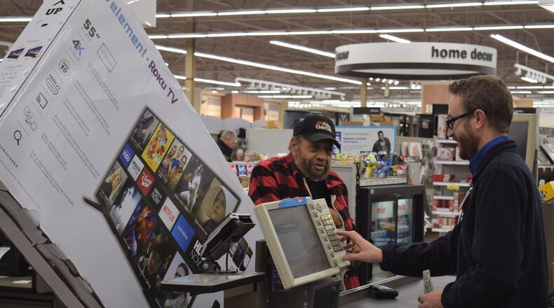 About 250 shoppers were at the Springboro Pike Meijer in Moraine at 6 a.m. Thursday when deals started. STAFF PHOTO / HOLLY SHIVELY