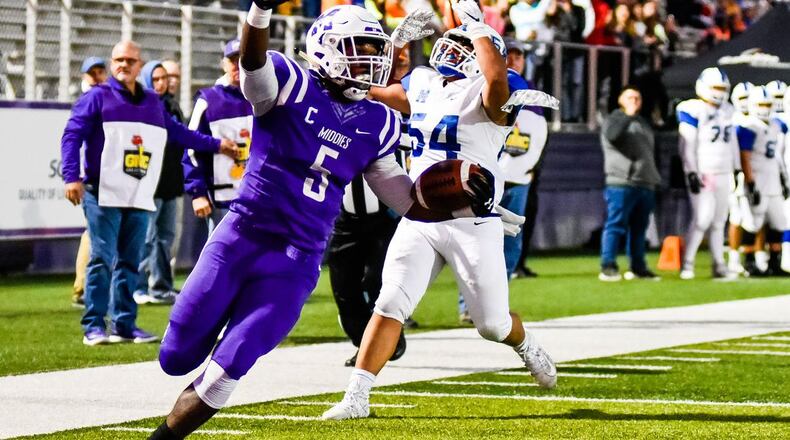 Middletown’s Josh Bryant carries the ball in for a touchdown during their football game against Hamilton Oct. 18, 2019, at Barnitz Stadium in Middletown. Hamilton Big Blue defeated Middletown Middies 41-24. NICK GRAHAM / STAFF FILE