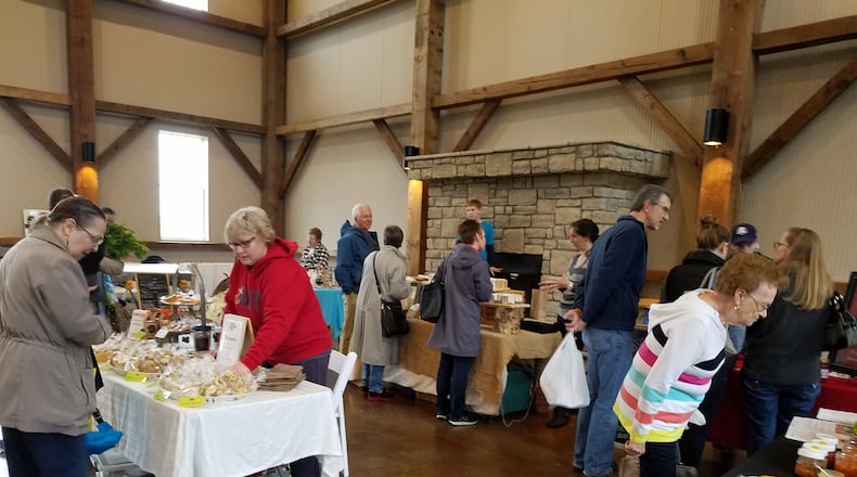 The winter farmers market at the Muhlhauser Barn in West Chester Twp. opened for business last month to about 200 shoppers. CONTRIBUTED