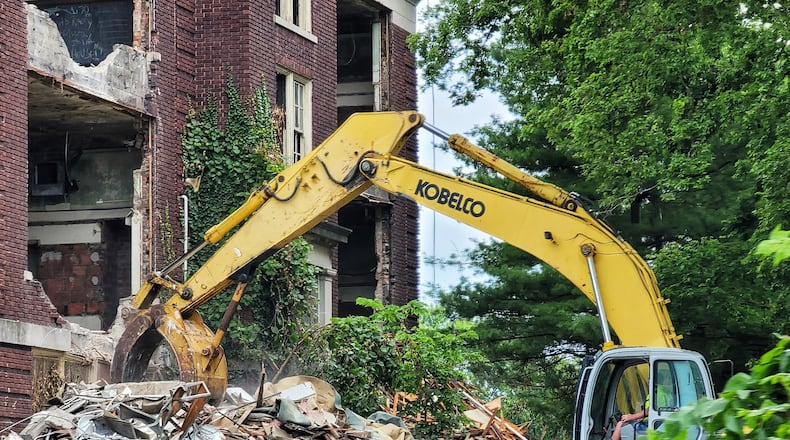Bricks are available from the former Lincoln School on Central Avenue. They must be picked up curb-side and people are not permitted near the school. NICK GRAHAM/STAFF