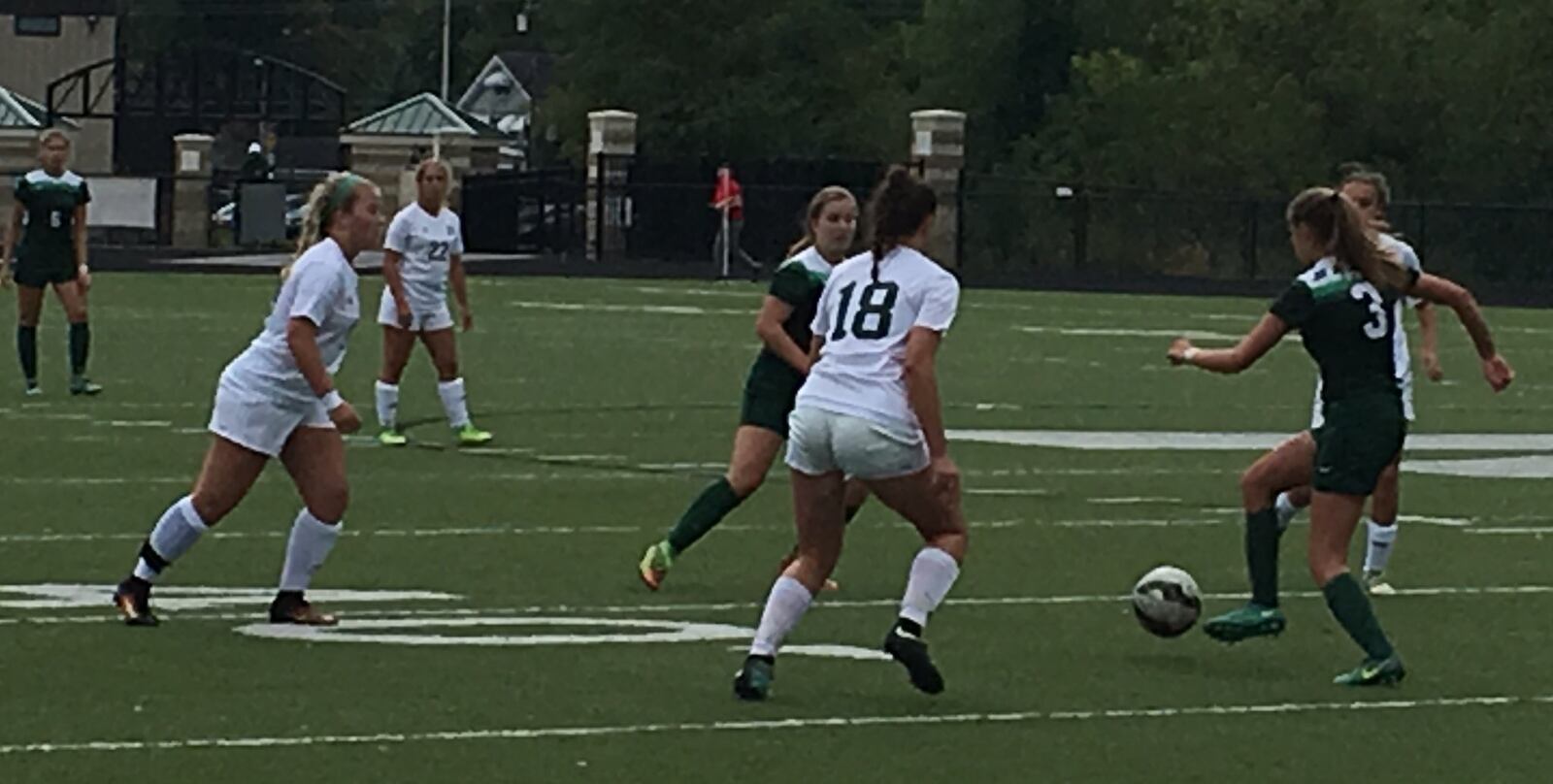 Badin’s Lexi Berkely (3) dribbles up the field as Maggie Szabo (18) of McNicholas defends Wednesday night at Penn Station Stadium in Cincinnati. RICK CASSANO/STAFF