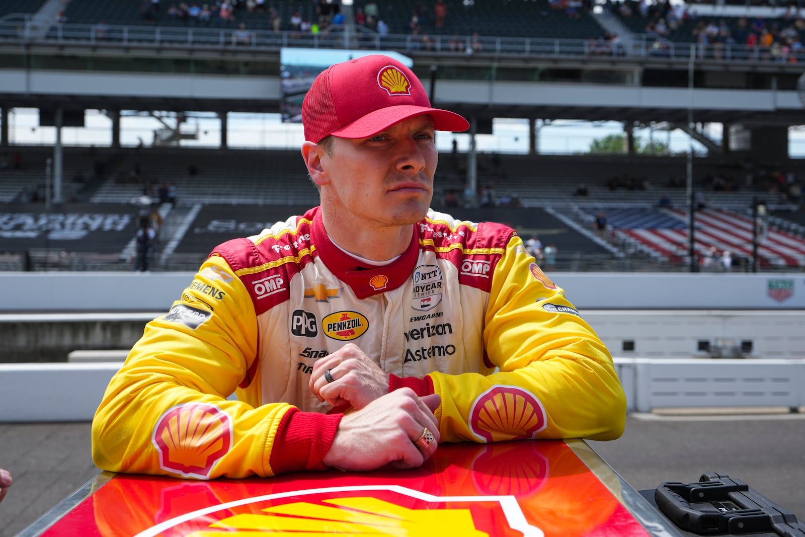 Josef Newgarden watches as his team tows his car following practice for the Indianapolis 500 auto race at the Indianapolis Motor Speedway in Indianapolis, Monday, May 19, 2025. (AP Photo/Michael Conroy)