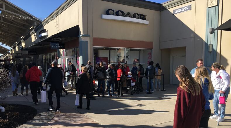 The Cincinnati Premium outlet mall has extended its hours for the holiday. ED RICHTER/STAFF