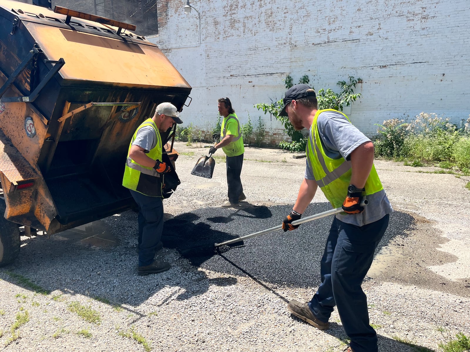Middletown crews went out Wednesday, July 2 to fill potholes in Sorg Opera House's city-owned parking lot. PROVIDED
