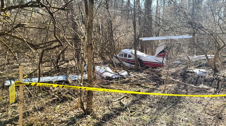 An airplane in the woods was used for scenes of a being filmed at Hueston Woods State Park Feb. 12, 2024. NICK GRAHAM/STAFF
