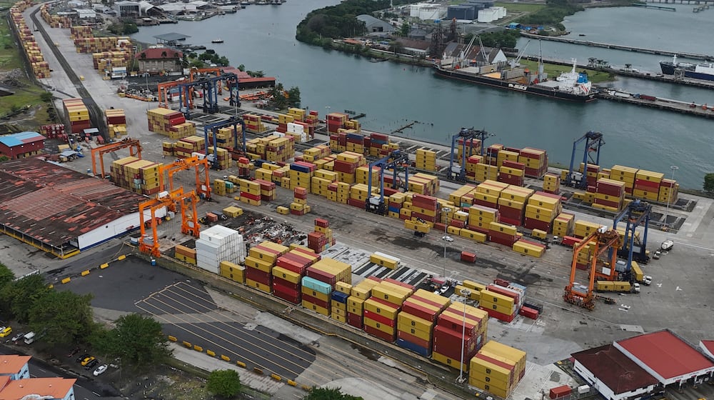 An aerial view of argo containers stacked at the Cristobal port, operated by the Panama Ports Company, in Colon, Panama, Friday, Feb. 6, 2026. (AP Photo/Matias Delacroix)