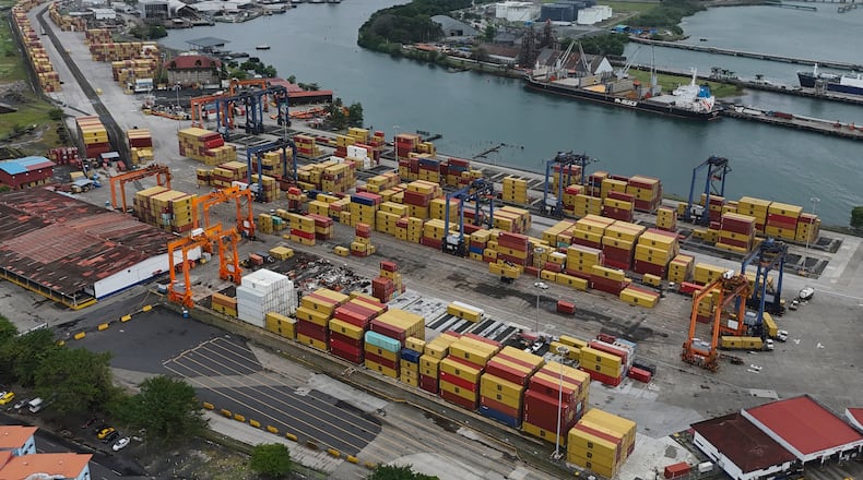 An aerial view of argo containers stacked at the Cristobal port, operated by the Panama Ports Company, in Colon, Panama, Friday, Feb. 6, 2026. (AP Photo/Matias Delacroix)