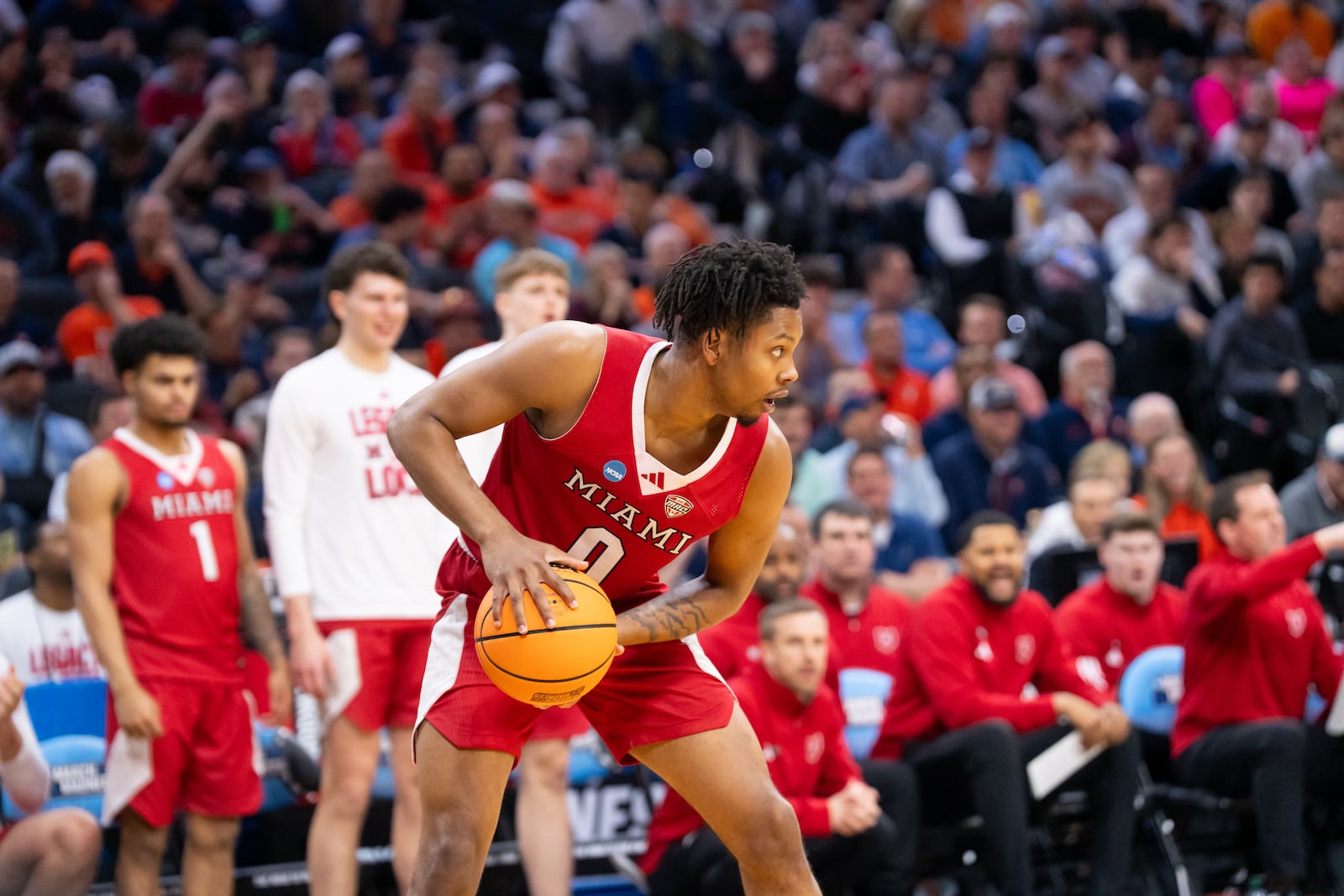 Miami's Eian Elmer looks for a passing lane during his NCAA Tournament game against Tennessee on Friday, March 20, 2026, at Xfiniti Mobile Arena in Philadelphia. NOAH MAURER / CONTRIBUTED