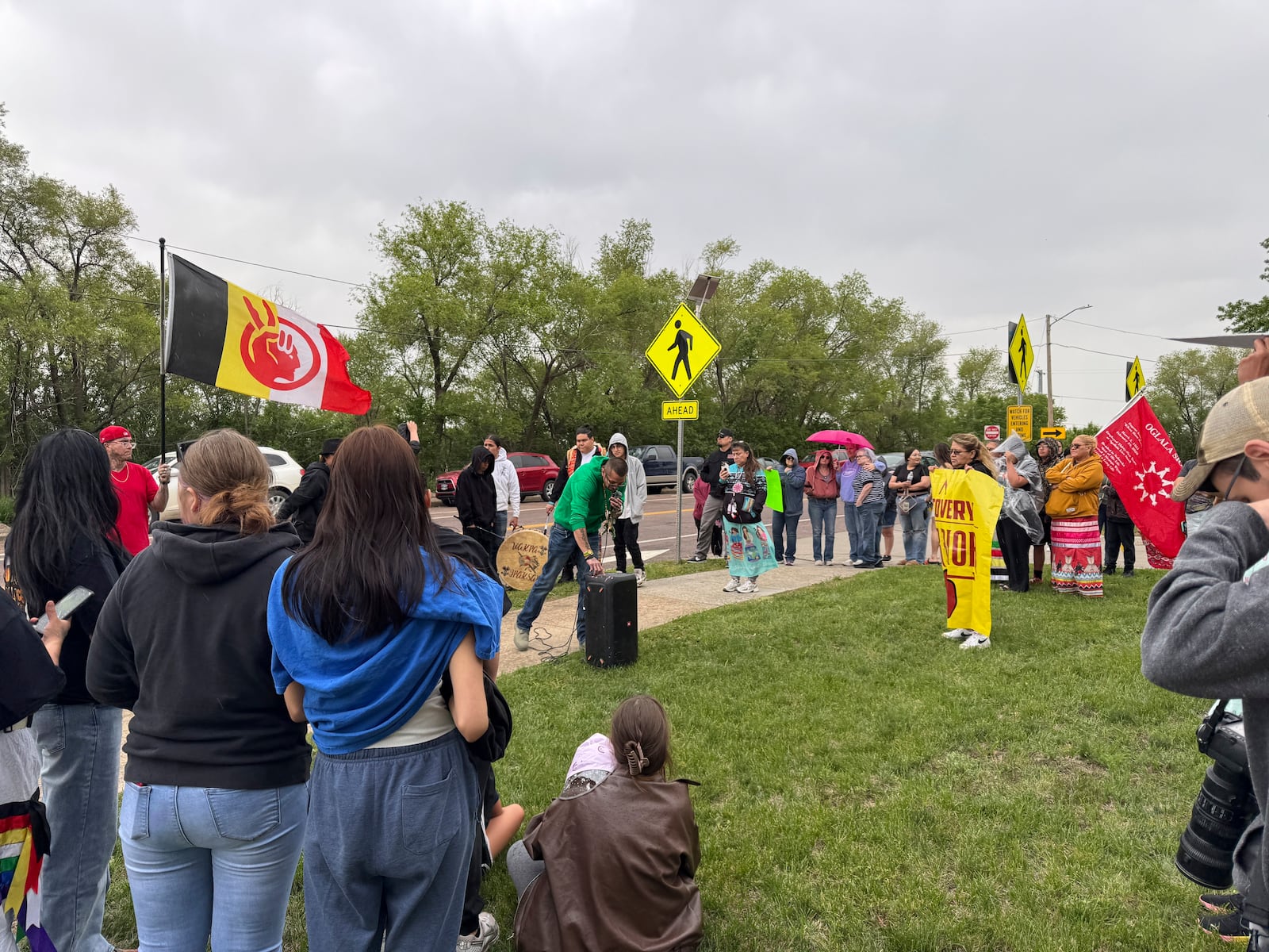 Protestors gather outside the South Dakota State Penitentiary on Friday, May 23, 2025 to protest about recent prison deaths. (AP Photo/Sarah Raza)