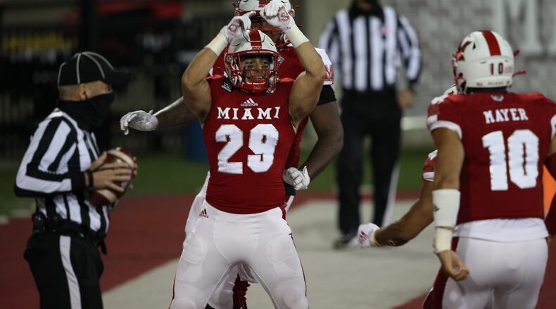 Miami fullback Zach Kahn celebrates a touchdown during Wednesday's 38-31 season-opening win over Ball State at Yager Stadium. Miami Athletics photo