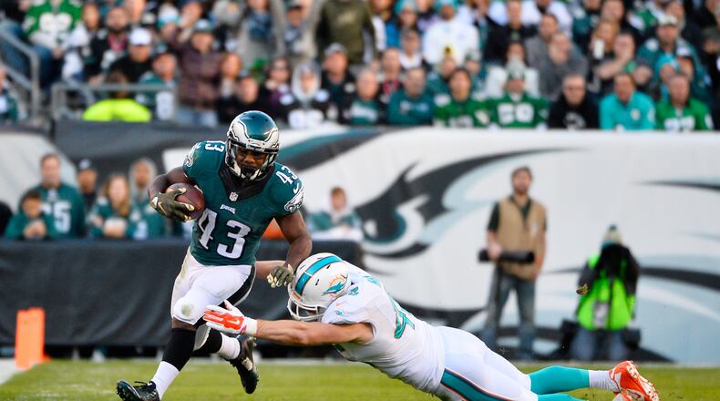 PHILADELPHIA, PA - NOVEMBER 15: Neville Hewitt #46 of the Miami Dolphins chases Darren Sproles #43 of the Philadelphia Eagles in the third quarter at Lincoln Financial Field on November 15, 2015 in Philadelphia, Pennsylvania. (Photo by Alex Goodlett/Getty Images)