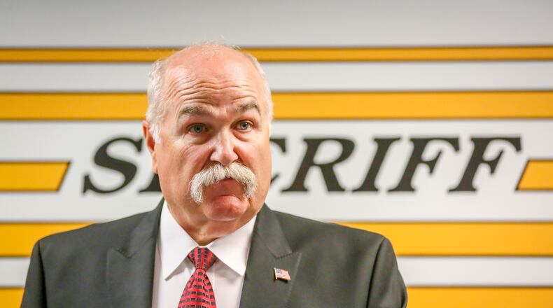 Butler County Sheriff Richard Jones warns residents about a scam in which a caller poses as a sheriff’s employee demanding money. GREG LYNCH / STAFF