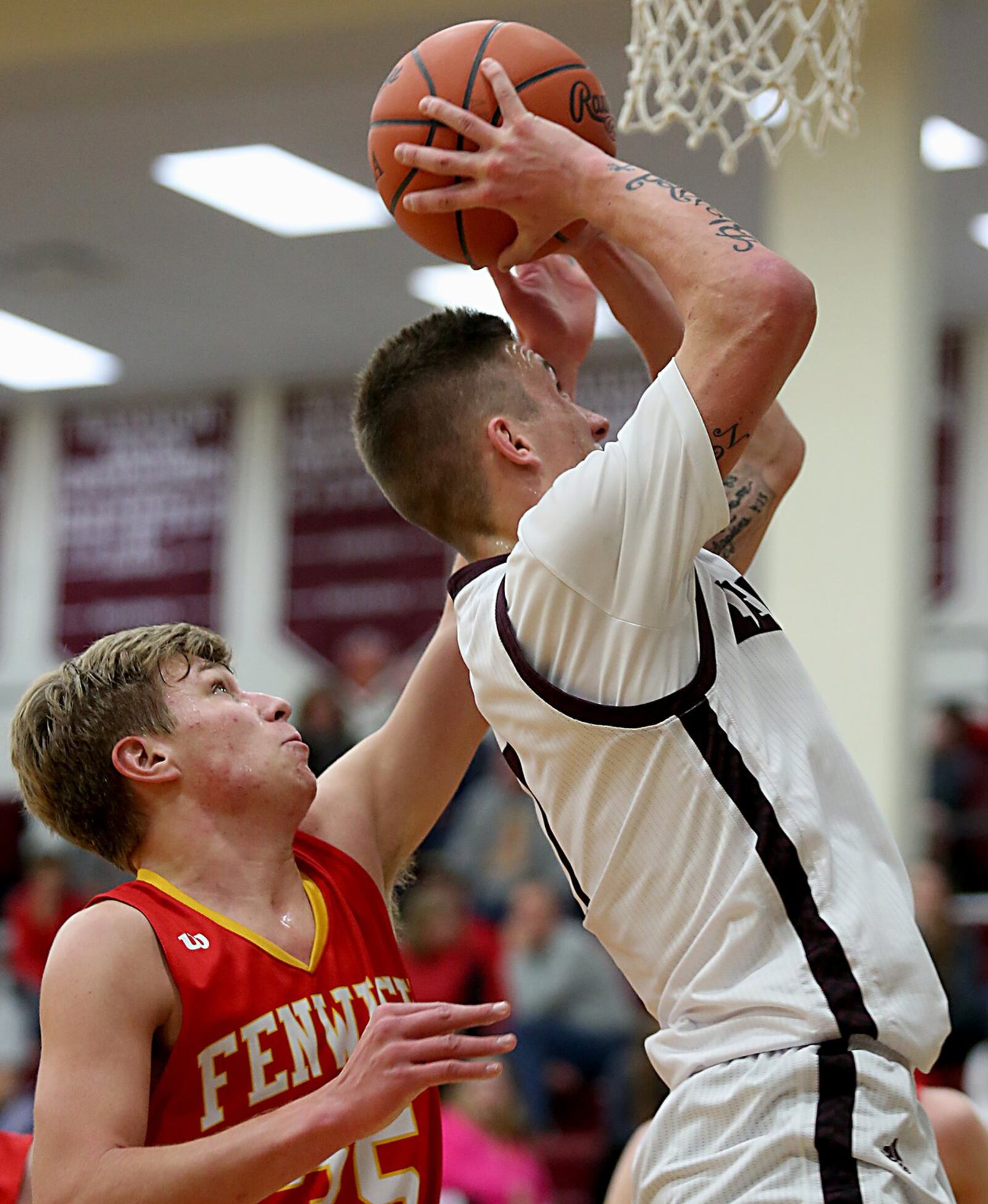 Fenwick forward Luke Bradshaw can’t stop Lebanon forward Dakota Allen from scoring during their game at Lebanon on Saturday night. CONTRIBUTED PHOTO BY E.L. HUBBARD