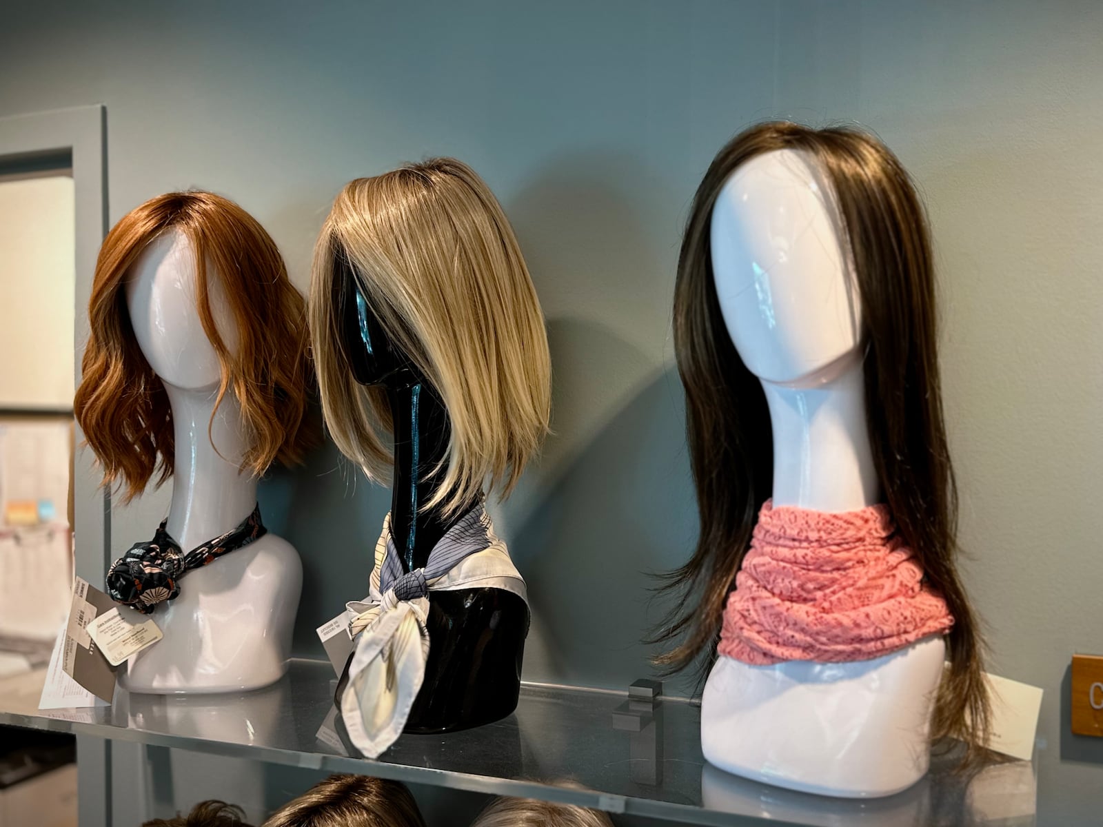 More hospitals are using a Cancer Center approach to treating the disease, providing everything a patient needs in one place such as these wigs available at Kettering Health's Renew Boutique and Spa. CONTRIBUTED