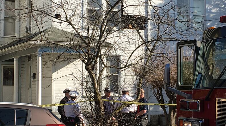 Fire and police in Hamilton responded to a home in the 100 block of North Seventh Street on a report that part of the building has collapsed. (Rick McCrabb/Staff)