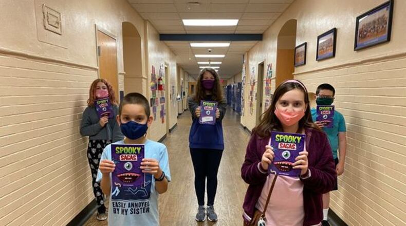 Students at Dennis Elementary and Springboro Intermediate recently had their stories published in a book. Last school year, fourth-grade Dennis Elementary Teachers Deb Covey and Kelley Profitt, encouraged their students to participate in the Young Writers Contest. The students were assigned a topic, then wrote and submitted their own poem with the hope of being published into the final book. The students just received their very own printed copy.