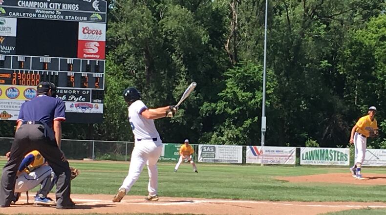 Cincinnati Christian’s Jacob Carroll singles in the seventh inning off Russia pitcher Jack Dapore on May 24 at Carleton Davidson Stadium in Springfield. Carroll had two hits and two RBIs in the Cougars’ 6-1 Division IV regional semifinal victory. RICK CASSANO/STAFF