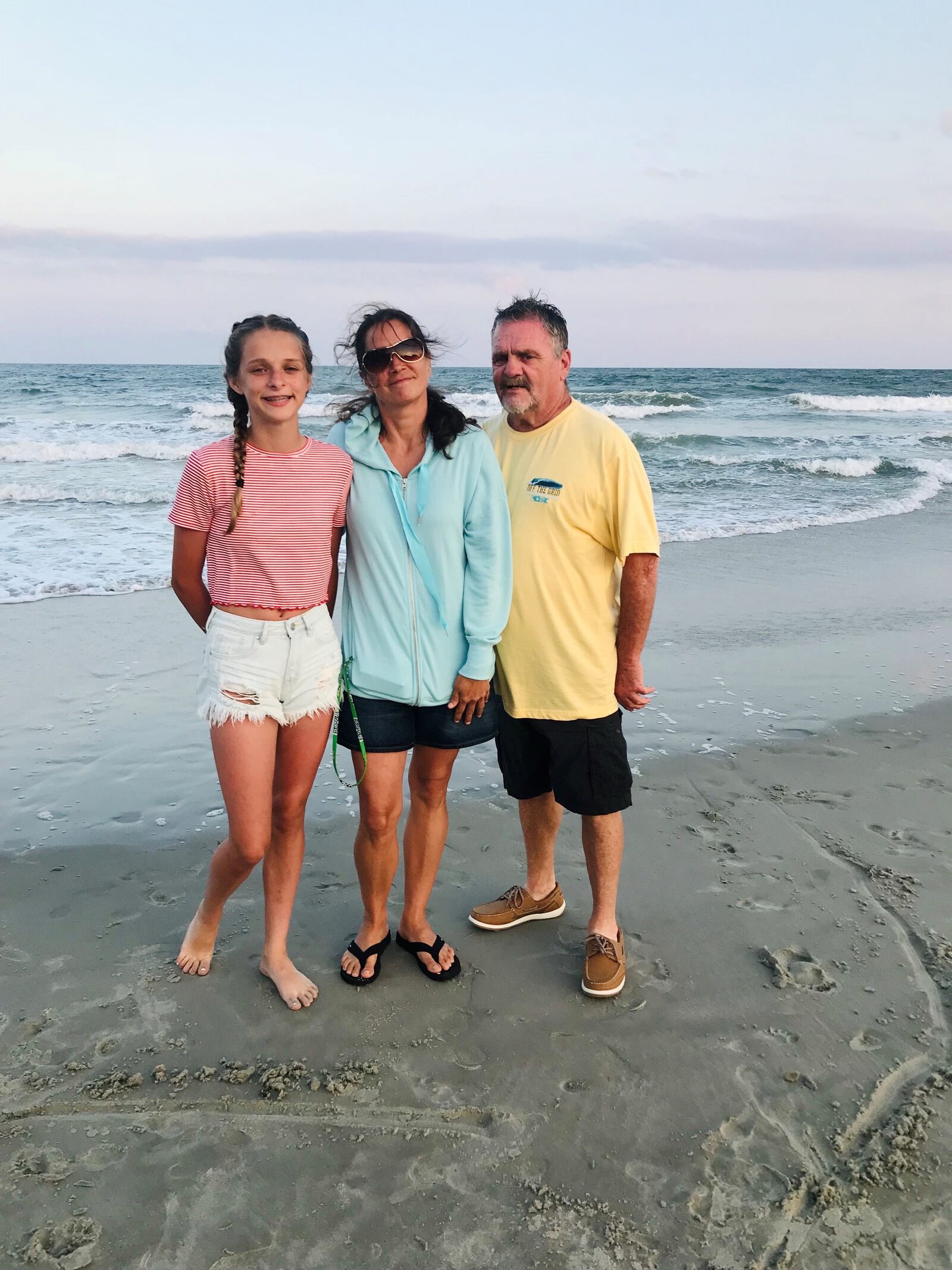 Wayne Oney, of Middletown, died of the coronavirus last month. He was 69. He's pictured with his wife, Lisa, and daughter, Emily. SUBMITTED PHOTO